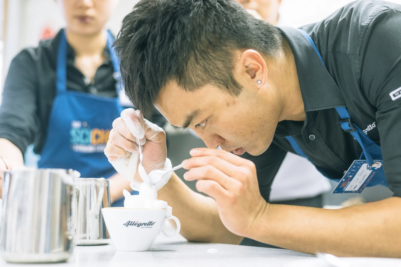 Chief barista Leo Chau from Allegretto Viva Espresso demonstrates the 3D latte art