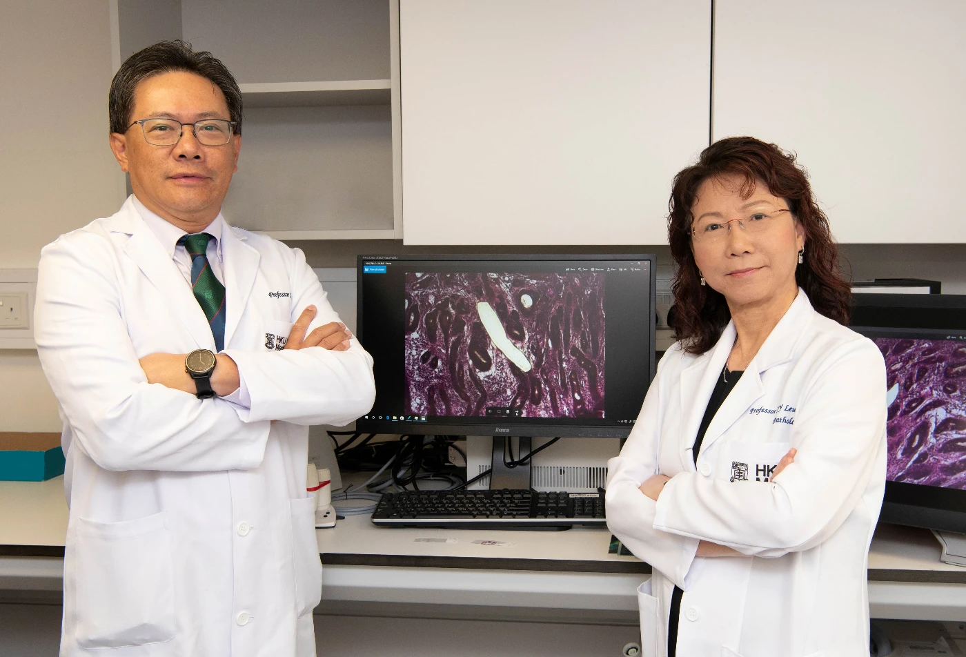 The HKUMed research team: Professor Simon Law Ying-kit (left) and Professor Leung Suet-yi.