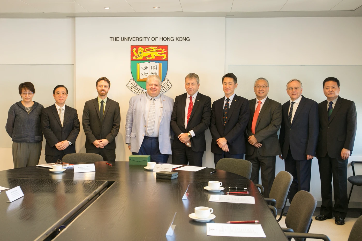 (From left) Professor Barbara Chan, Associate Dean (Research) of the Faculty of Engineering, HKU; Professor Bennett Yim, Associate Dean (Postgraduate) of the Faculty of Business and Economics, HKU;  Mr. Tom Windle, UCL Senior Partnership Manager (East and South East Asia); Professor David Price, UCL Vice-President and Vice-Provost (Research); Professor Peter Mathieson, HKU President and Vice-Chancellor; Professor W John Kao, HKU Vice-President and Pro-Vice-Chancellor (Global); Professor Michael Hor, Dean of the Faculty of Law, HKU; Professor Stephen Andrews, Dean of the Faculty of Education, HKU; Professor Rui Yang, Associate Dean (Cross-border/International Engagement) of the Faculty of Education, HKU.