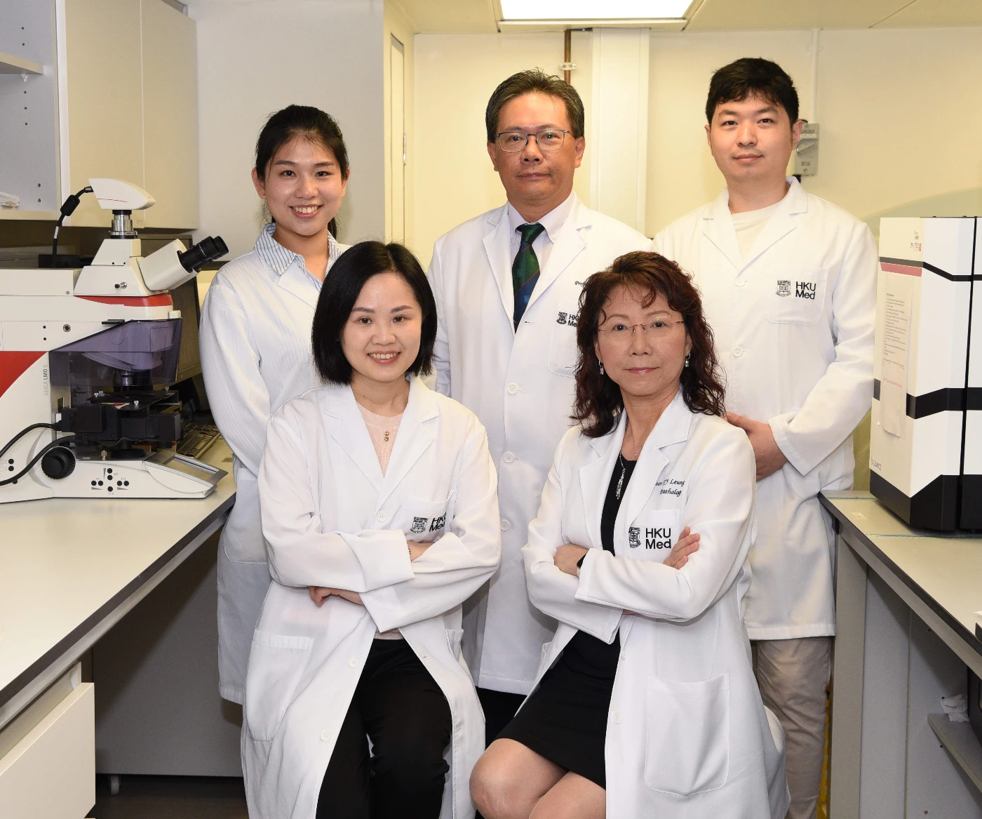 The HKUMed research team: Professor Leung Suet-yi (right, front), Professor Simon Law Ying-kit (centre, back), and Professor Helen Yan Hoi-ning (left, front).