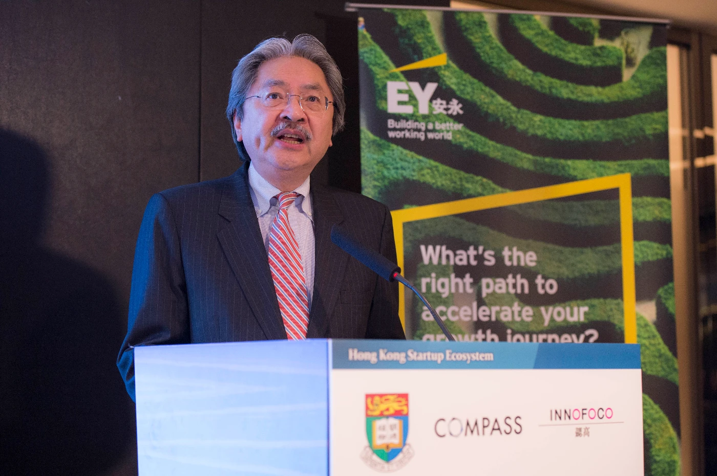 FS Mr John Tsang addressing the audience at the conference