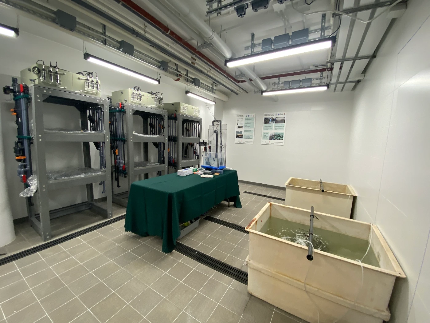 Image 9: Aquarium - Expanded from the existing structure, containing approximately 50-60 individual tanks in different dimensions to accommodate species of different sizes. The aquarium is designed specifically in a controlled environment where lighting and temperature are adjustable for manipulating a day cycle that simulates an environment according to the needs of different species.