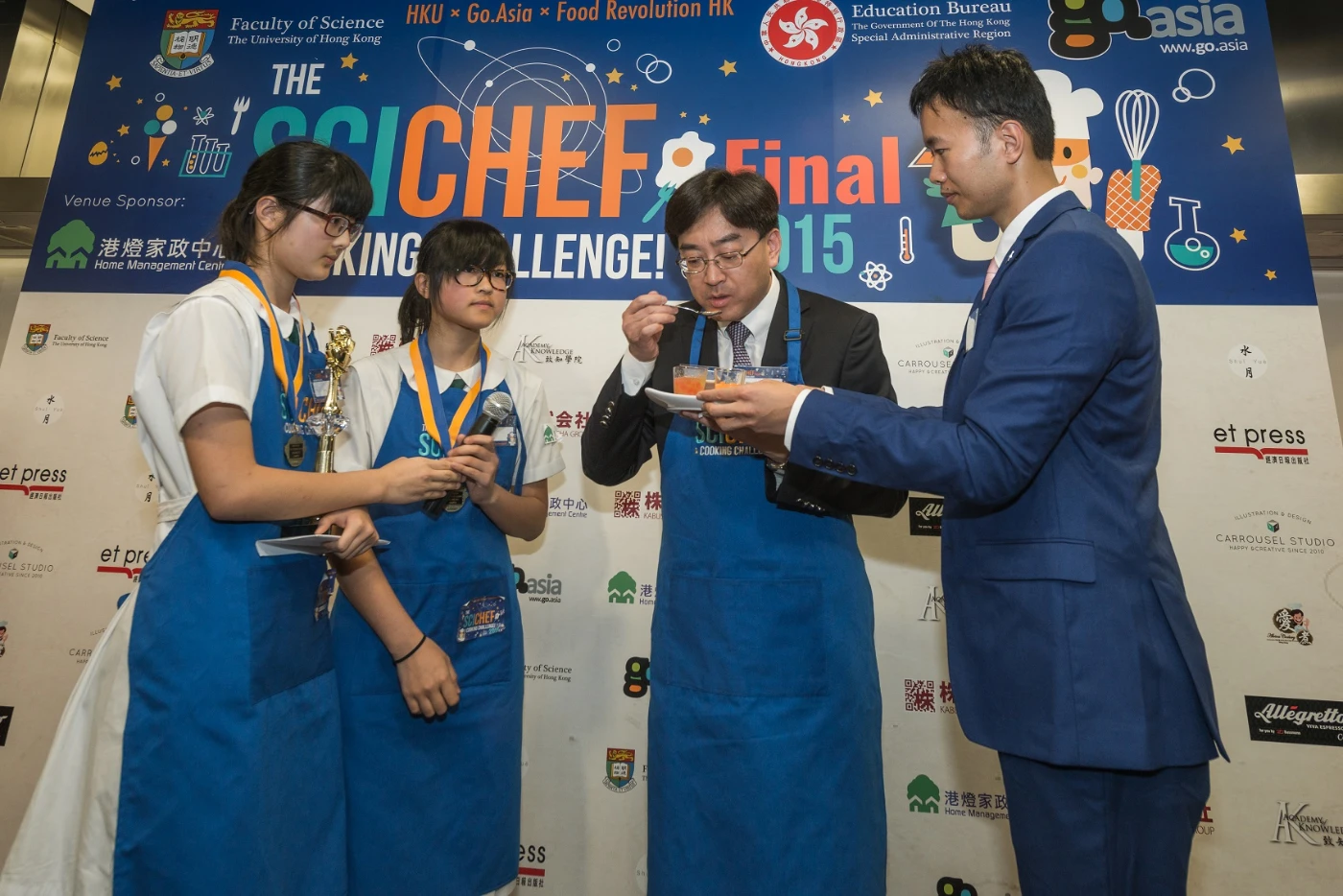 Dr Ko tastes the dish prepared by the Champions